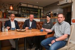 L-R Hospitality Ulster Chief Executive and Finance Minister Conor Murphy meet Jacqueline and James Higginson during a visit to Portaferry.JPG