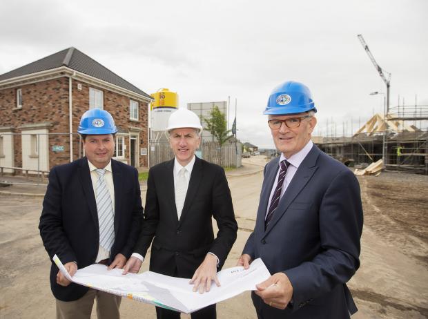 Finance Minister Máirtín Ó Muilleoir MLA pictured with John Armstrong, managing director CEF and David Magee, Antrim Construction Company LTD