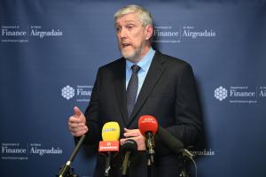 Finance Minister John O'Dowd speaking at press conference