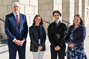 Finance Minister John O’Dowd with students Erin Bradley (Second from left) and Sean McClure, (second from Right), along with Department for Infrastructure Permanent Secretary Emer Morelli