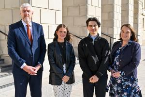 Finance Minister John O’Dowd with students Erin Bradley (Second from left) and Sean McClure, (second from Right), along with Department for Infrastructure Permanent Secretary Emer Morelli